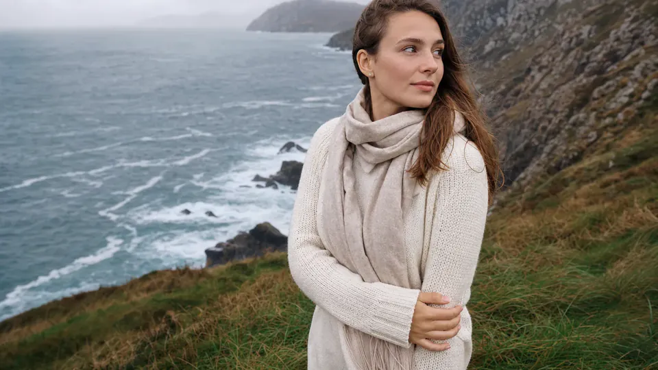 Same coastal portrait sharpened and upscaled by Pixelyft