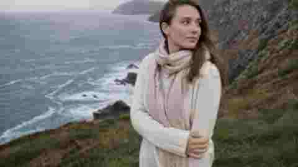 Soft low-resolution coastal portrait before enhancement
