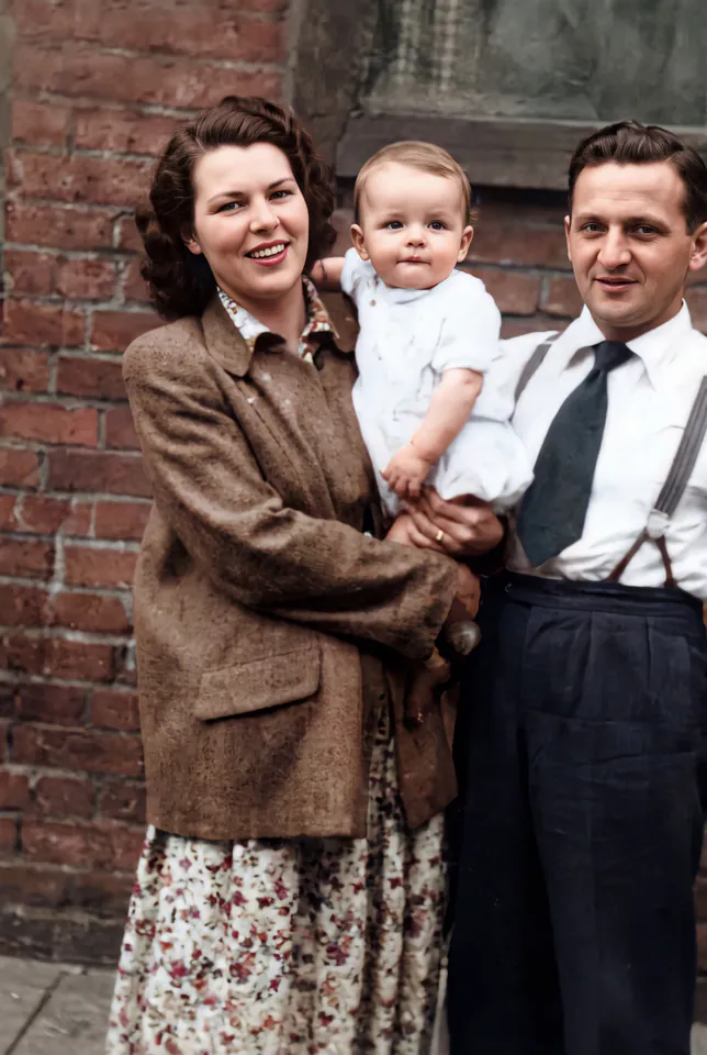 Same family photograph sharpened and colorized in natural tones
